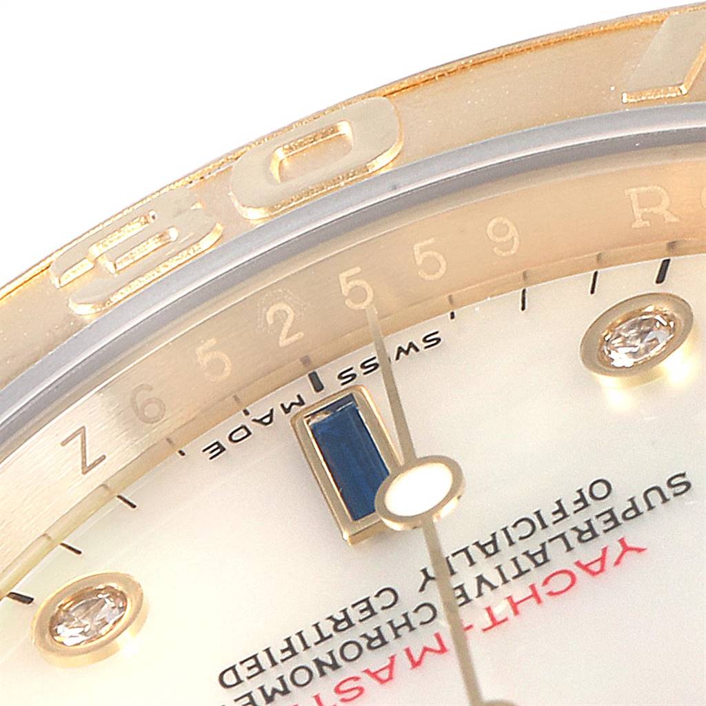 The close-up angle shows the dial, part of the bezel, and some hour markers of the Rolex Yacht-Master 26029 Men
s Yellow Gold Mother of Pearl Dial 26029 Men
s Yellow Gold Mother of Pearl Dial watch.