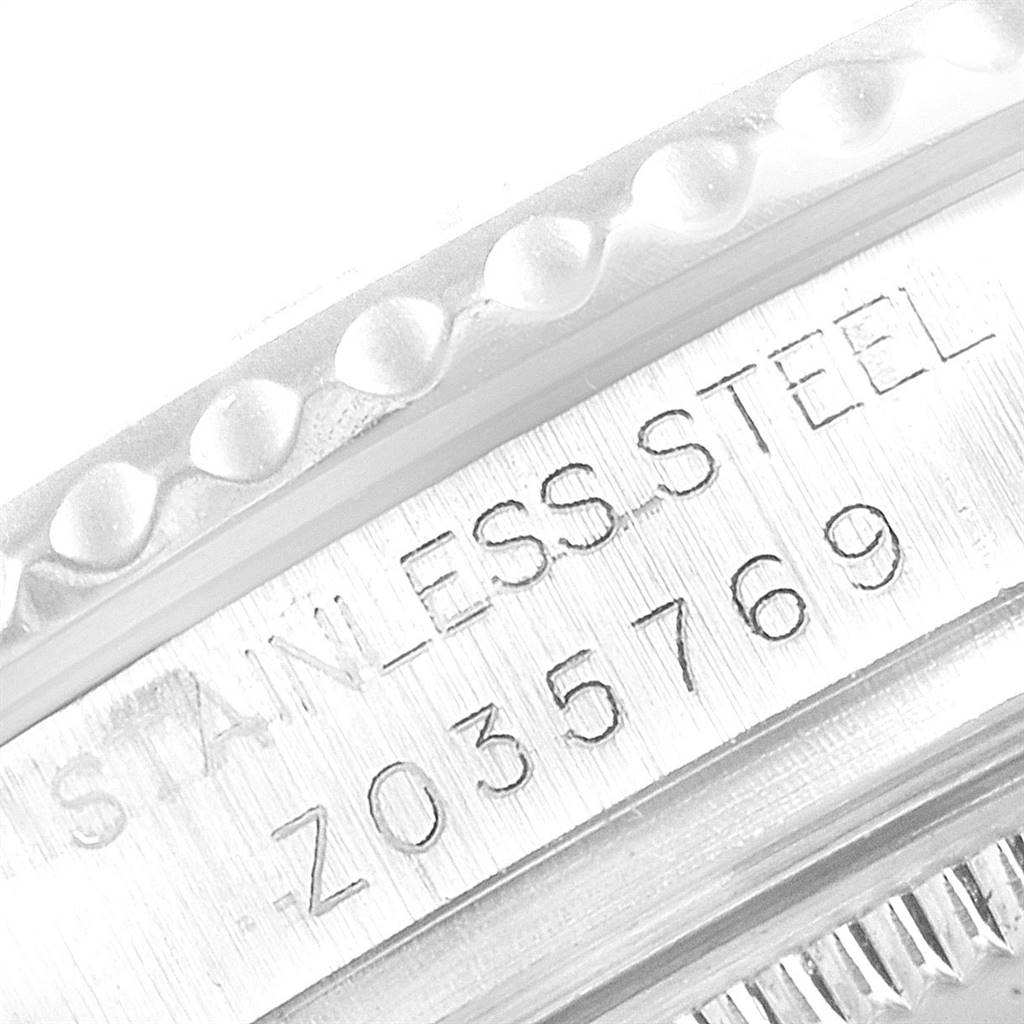 This image shows a close-up of the case side of a Rolex Yacht-Master 168622 Men
s Stainless Steel Silver Dial 168622 Men
s Stainless Steel Silver Dial watch, highlighting the stainless steel and serial number.