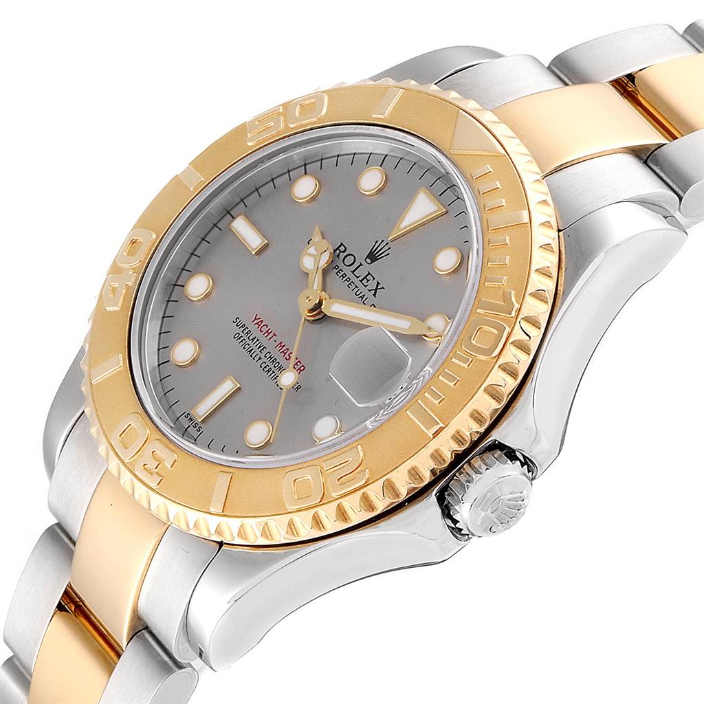 The image shows the Rolex Yacht-Master 168623 Men's Steel and Gold (two tone) Grey Dial 168623 Men's Steel and Gold (two tone) Grey Dial watch at an angled view, highlighting the dial, bezel, and part of the bracelet.