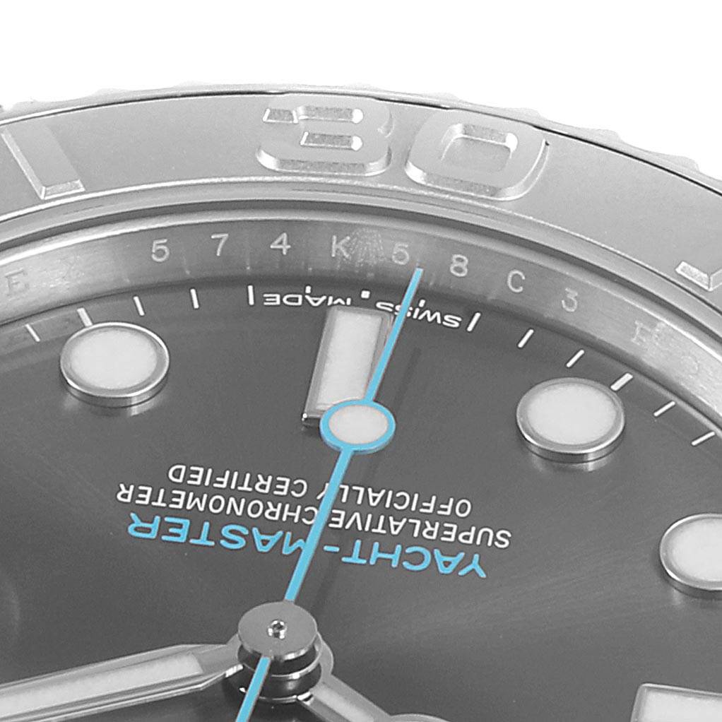 This close-up image shows the dial and part of the bezel of the Rolex Yacht-Master 268622 Men
s Stainless Steel Grey Dial 268622 Men
s Stainless Steel Grey Dial watch, including the hands and markers.