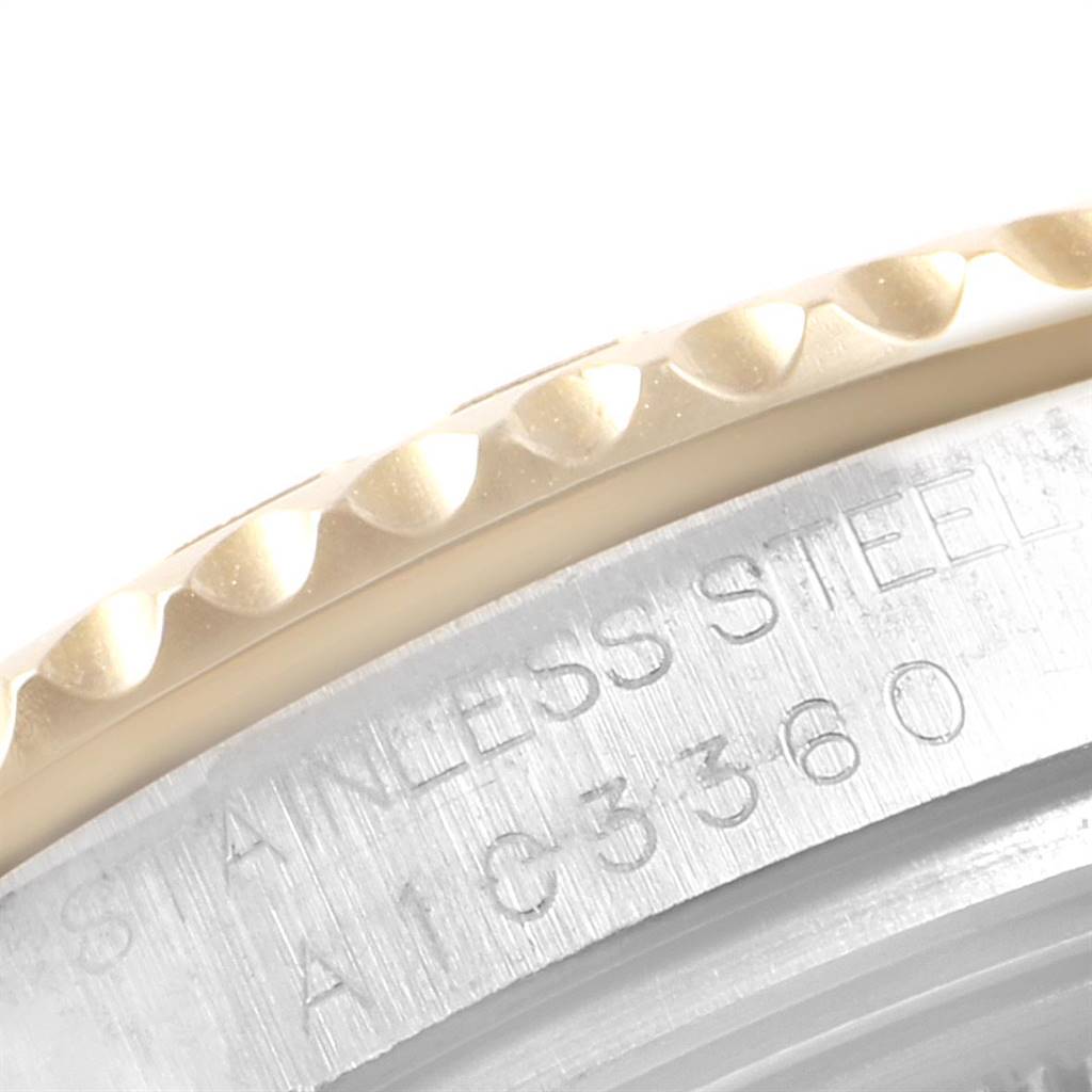 The image shows a close-up angle of the bezel and part of the case back of a Rolex Yacht-Master 68623 Men's Steel and Gold (two tone) White Dial 68623 Men's Steel and Gold (two tone) White Dial watch.