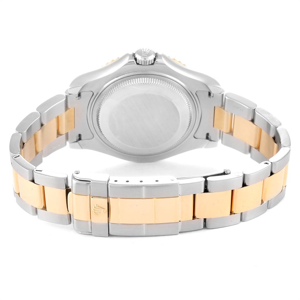The image shows the back side of the Rolex Yacht-Master 68623 Men's Steel and Gold (two tone) White Dial 68623 Men's Steel and Gold (two tone) White Dial watch, focusing on the case back and two-tone bracelet.