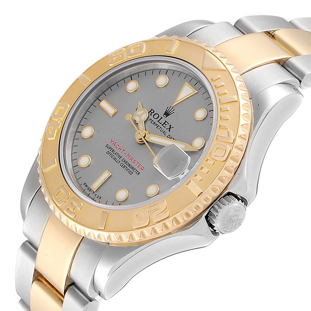 The image shows a close-up angle of the Rolex Yacht-Master 68623 Men
s Steel and Gold (two tone) Grey Dial 68623 Men
s Steel and Gold (two tone) Grey Dial watch, highlighting the dial, bezel, crown, and two-tone bracelet.