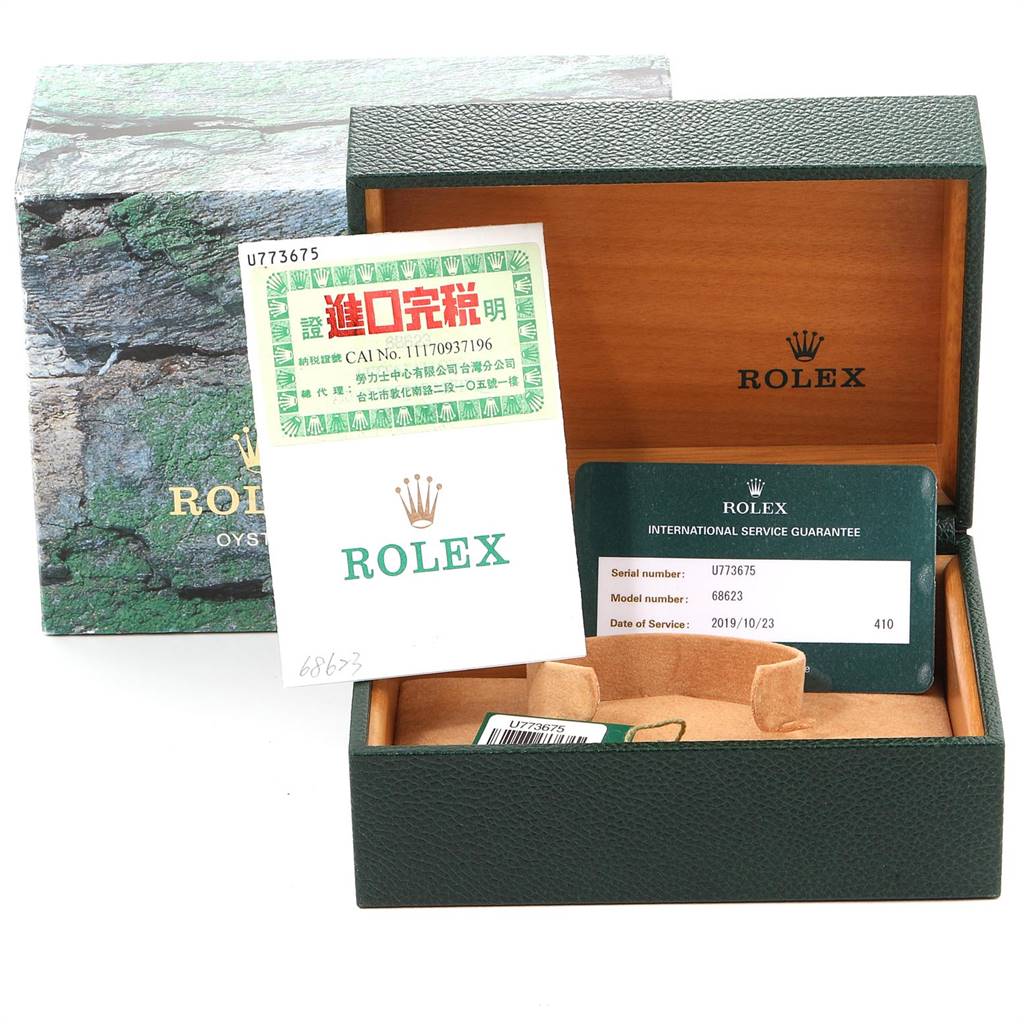 The image shows the packaging, including the box and Best Quality
ation papers, for a Rolex Yacht-Master 68623 Men
s Steel and Gold (two tone) Grey Dial 68623 Men
s Steel and Gold (two tone) Grey Dial watch.