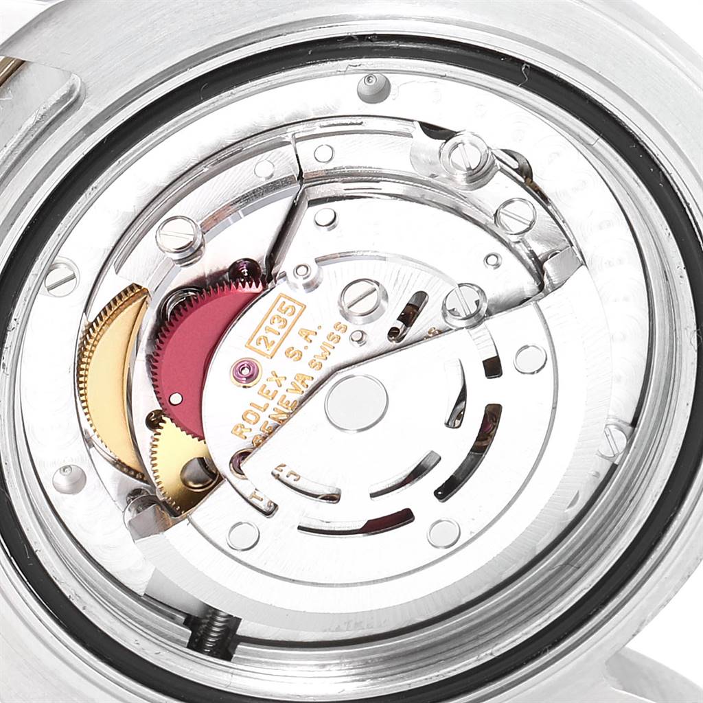 This image shows a close-up view of the movement mechanism inside a Rolex Yacht-Master 68623 Men
s Steel and Gold (two tone) Grey Dial 68623 Men
s Steel and Gold (two tone) Grey Dial watch.
