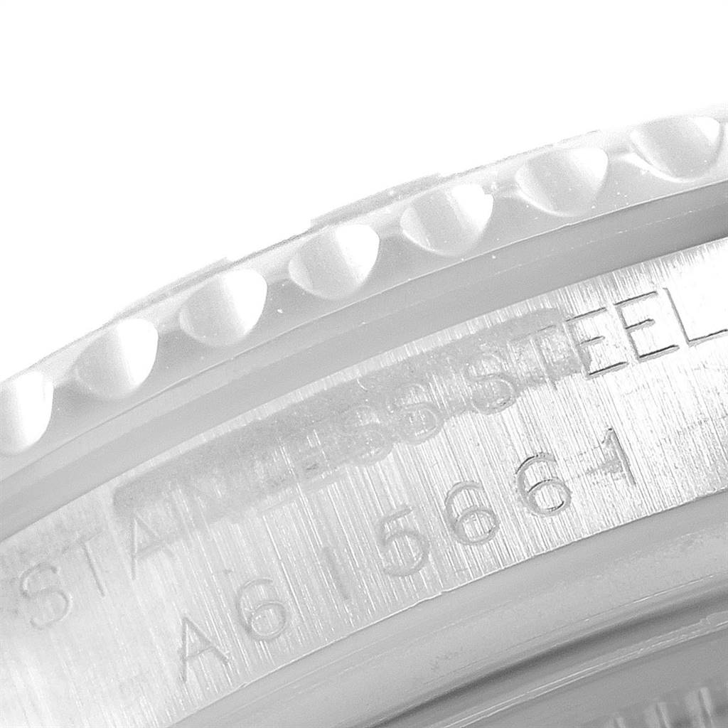 The image shows a close-up angle of the bezel and part of the case with serial markings of a Rolex Yacht-Master 168622 Men
s Stainless Steel Silver Dial 168622 Men
s Stainless Steel Silver Dial watch.