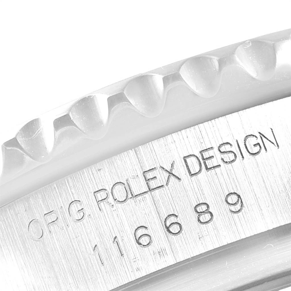 This close-up image shows the bezel edge and engraved markings on the side of the Rolex Yacht-Master 116689 Men's White Gold White Dial 116689 Men's White Gold White Dial watch case.