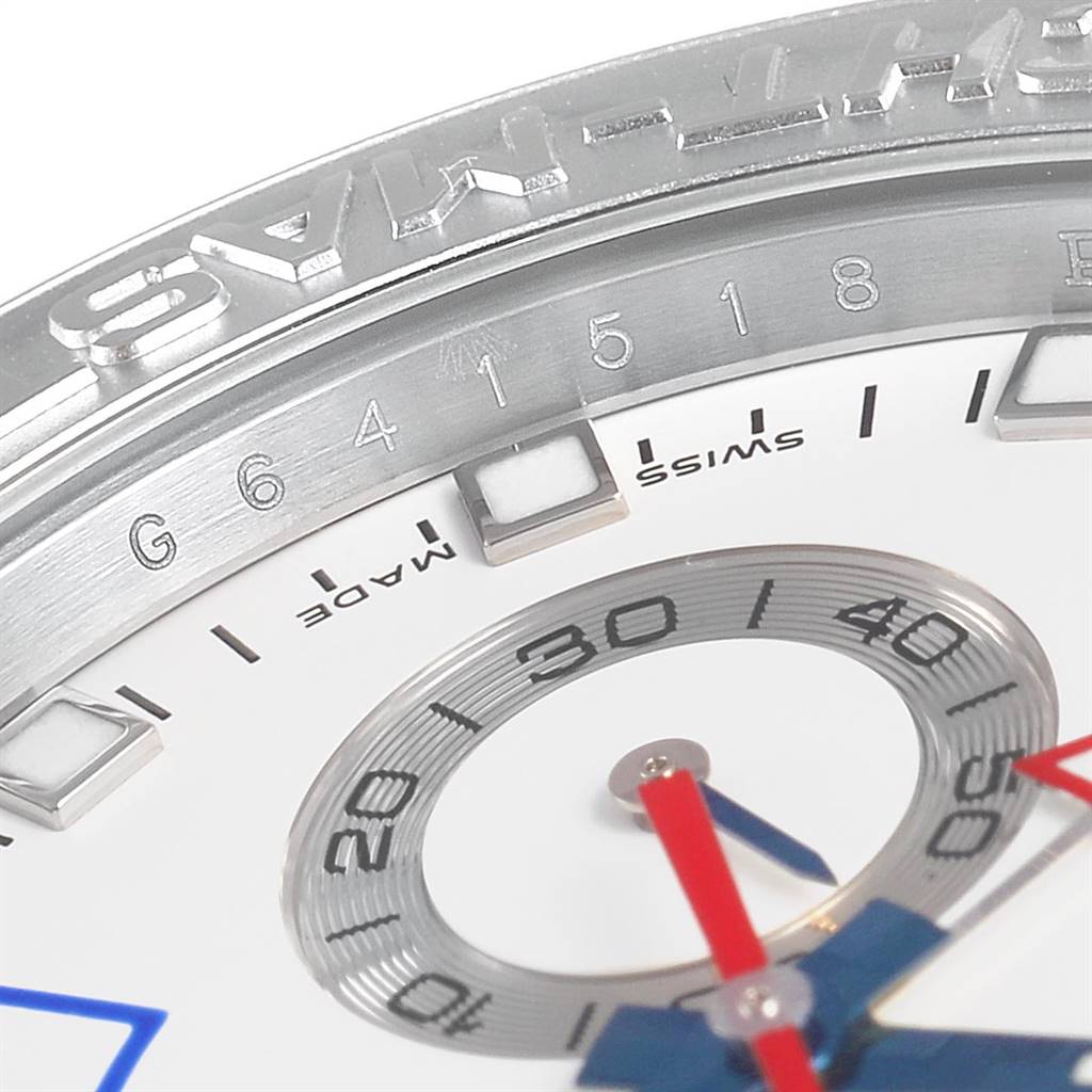 The image shows a close-up of the dial and bezel of the Rolex Yacht-Master 116689 Men's White Gold White Dial 116689 Men's White Gold White Dial watch, highlighting the numerals and minute markers.
