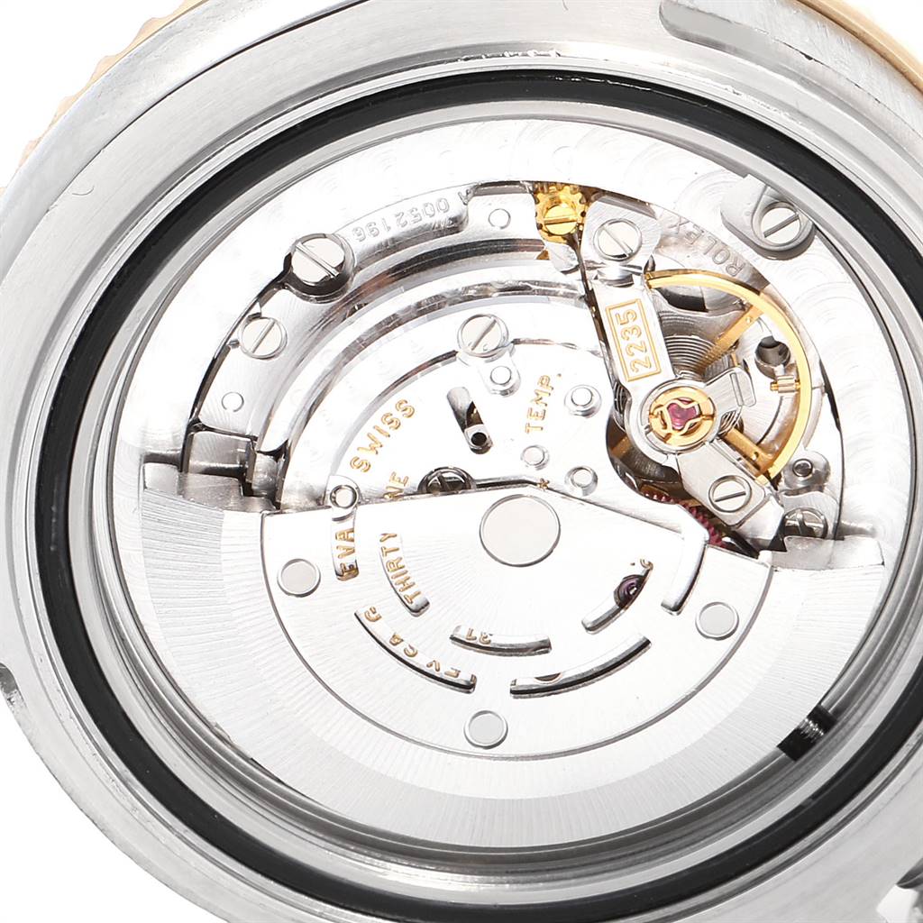 The image shows a close-up of the movement mechanism from the back of a Rolex Yacht-Master 168623 Men
s Steel and Gold (two tone) Grey Dial 168623 Men
s Steel and Gold (two tone) Grey Dial watch.