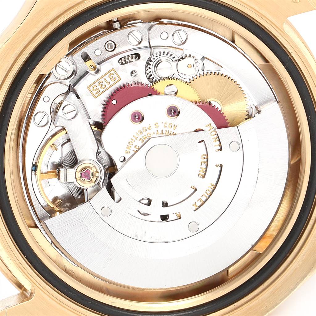 This image shows the internal mechanism of the Rolex Yacht-Master 16628 Men
s Yellow Gold Mother of Pearl Dial 16628 Men
s Yellow Gold Mother of Pearl Dial watch, highlighting its intricate gears and components.