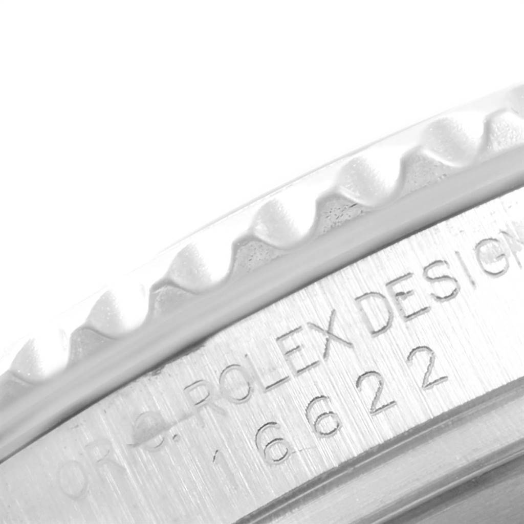 This image shows a close-up angled view of the bezel and case with engravings on a Rolex Yacht-Master 16622 Men
s Stainless Steel Silver Dial 16622 Men
s Stainless Steel Silver Dial watch.