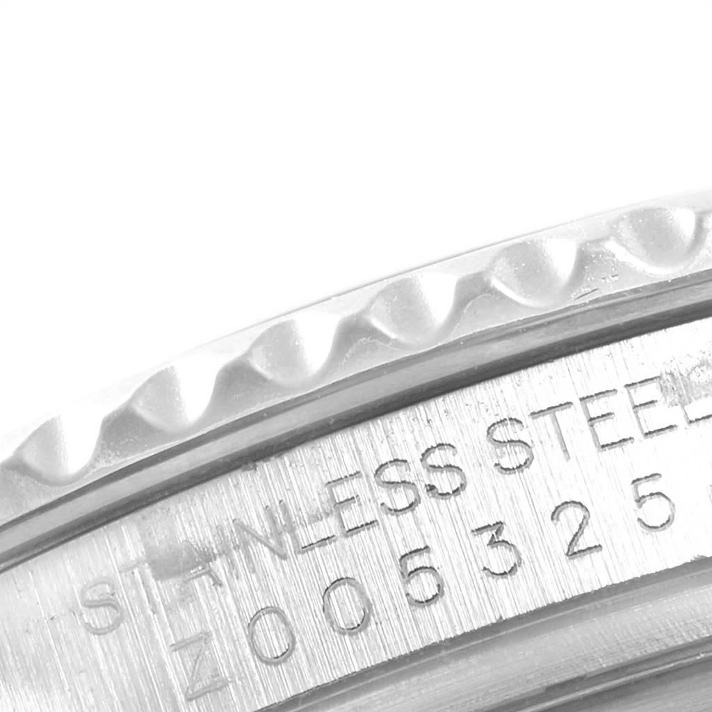 This close-up image shows the stainless steel casing part near the bezel of a Rolex Yacht-Master 16622 Men
s Stainless Steel Silver Dial 16622 Men
s Stainless Steel Silver Dial watch.