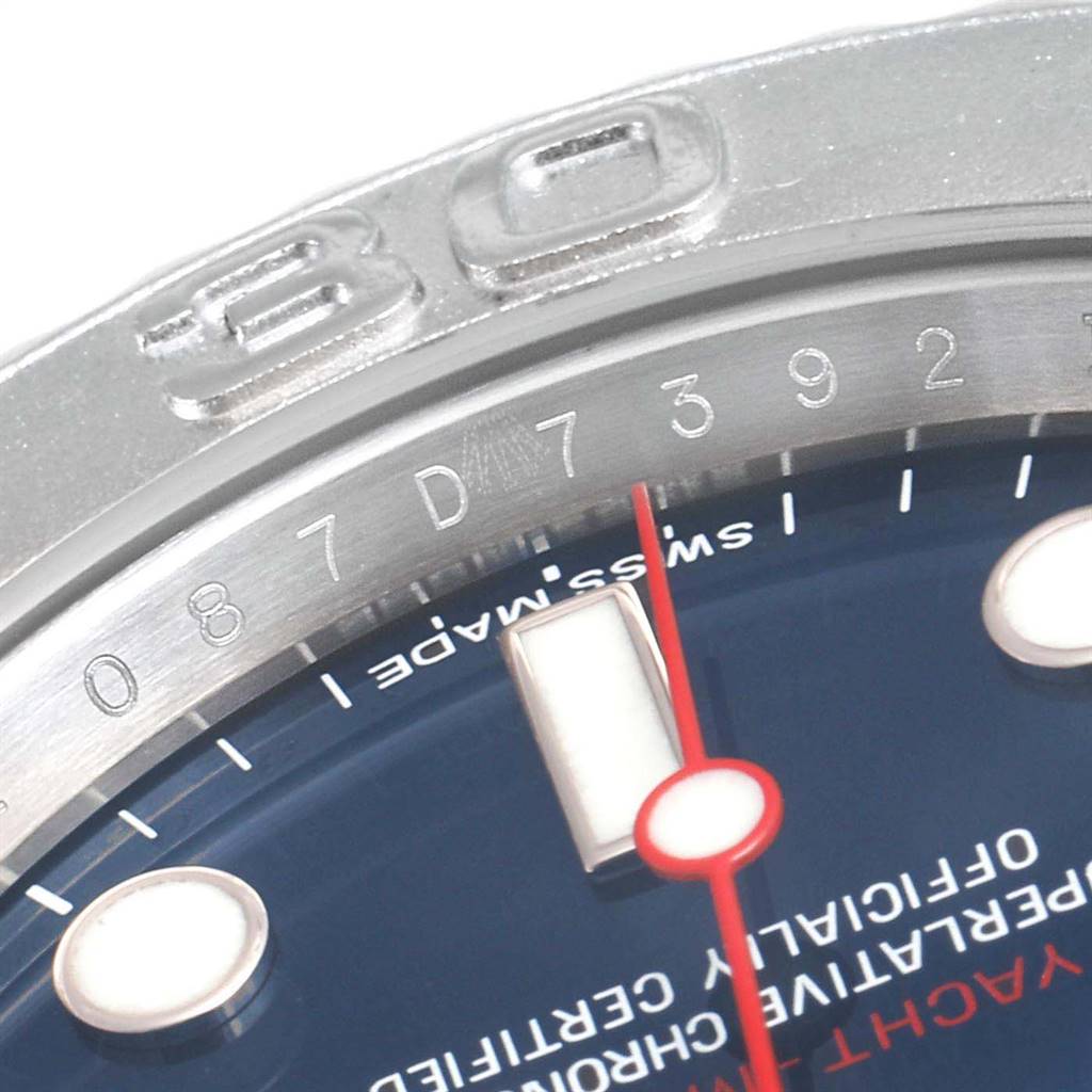 This close-up of the Rolex Yacht-Master 116622 Men
s Stainless Steel Blue Dial 116622 Men
s Stainless Steel Blue Dial shows part of the bezel, dial, and the "Swiss Made" and model text.