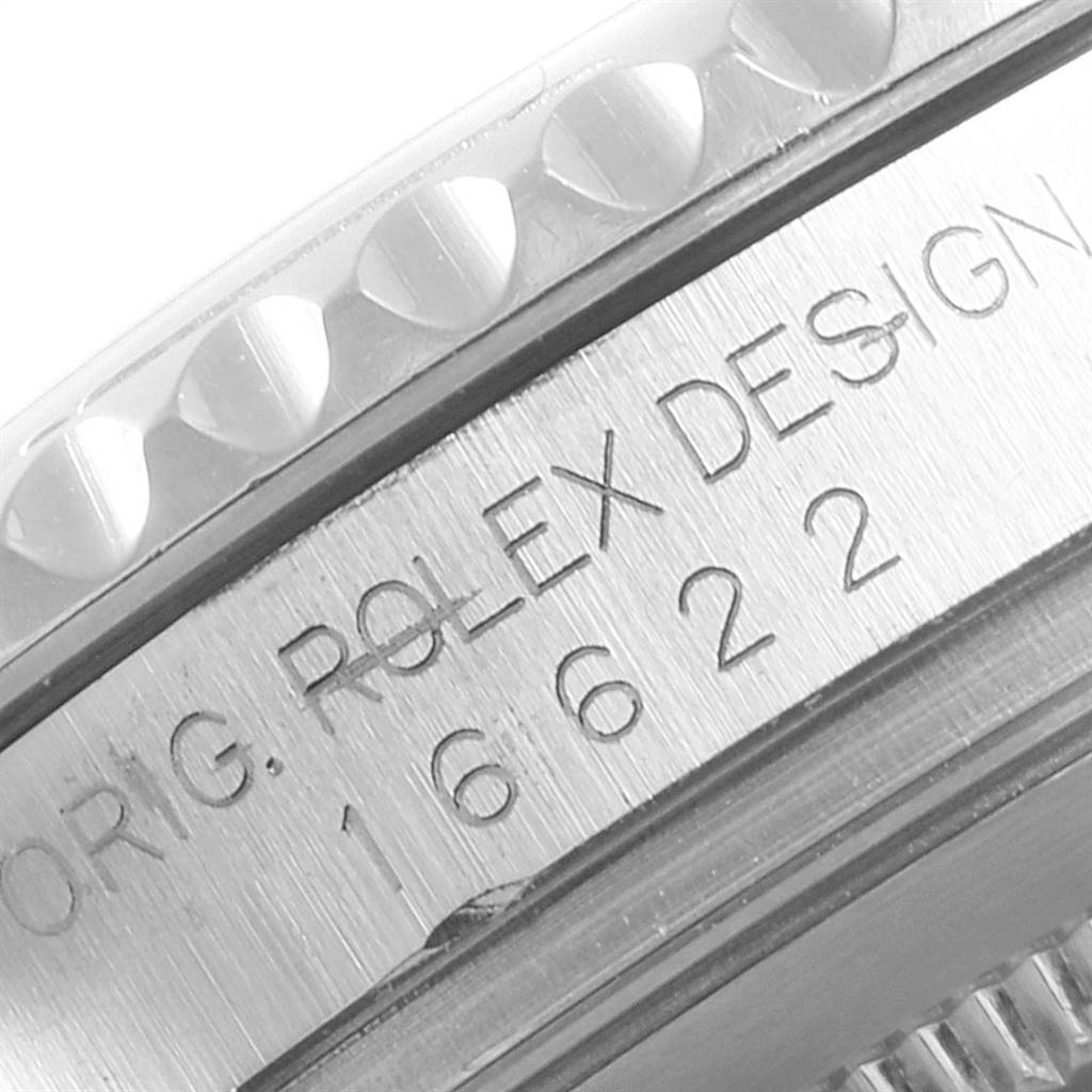 Close-up view of the side, showing the engraved 
Rolex Design
 and model number 16622 of the Rolex Yacht-Master 16622 Men
s Stainless Steel Silver Dial 16622 Men
s Stainless Steel Silver Dial.