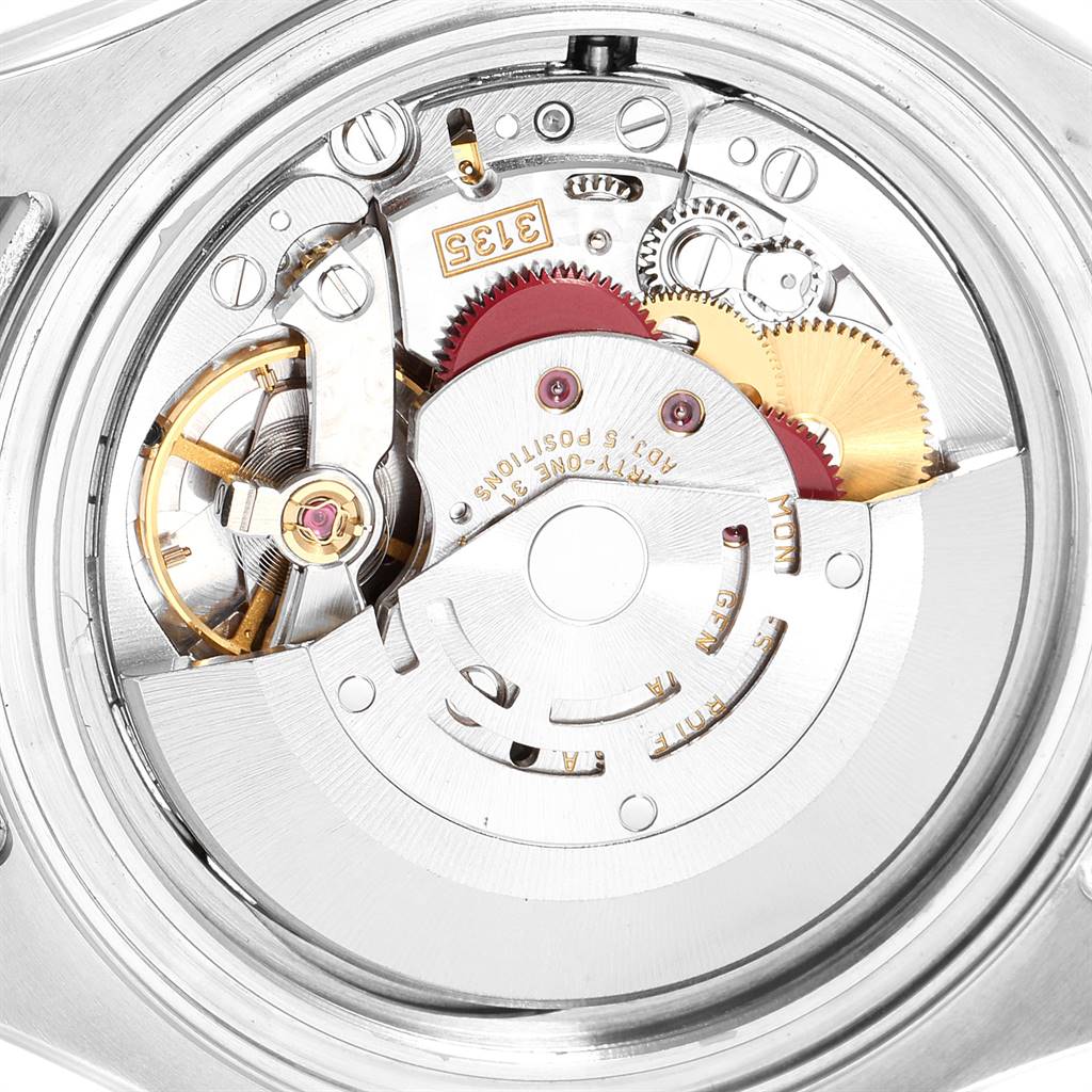 The image shows an up-close view of the Rolex Yacht-Master 16622 Men
s Stainless Steel Silver Dial 16622 Men
s Stainless Steel Silver Dial
s intricate internal mechanism.
