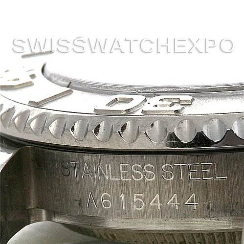 This close-up image shows the stainless steel bezel and serial number of a Rolex Yacht-Master 168622 Stainless Steel Silver Dial 168622 Stainless Steel Silver Dial watch.