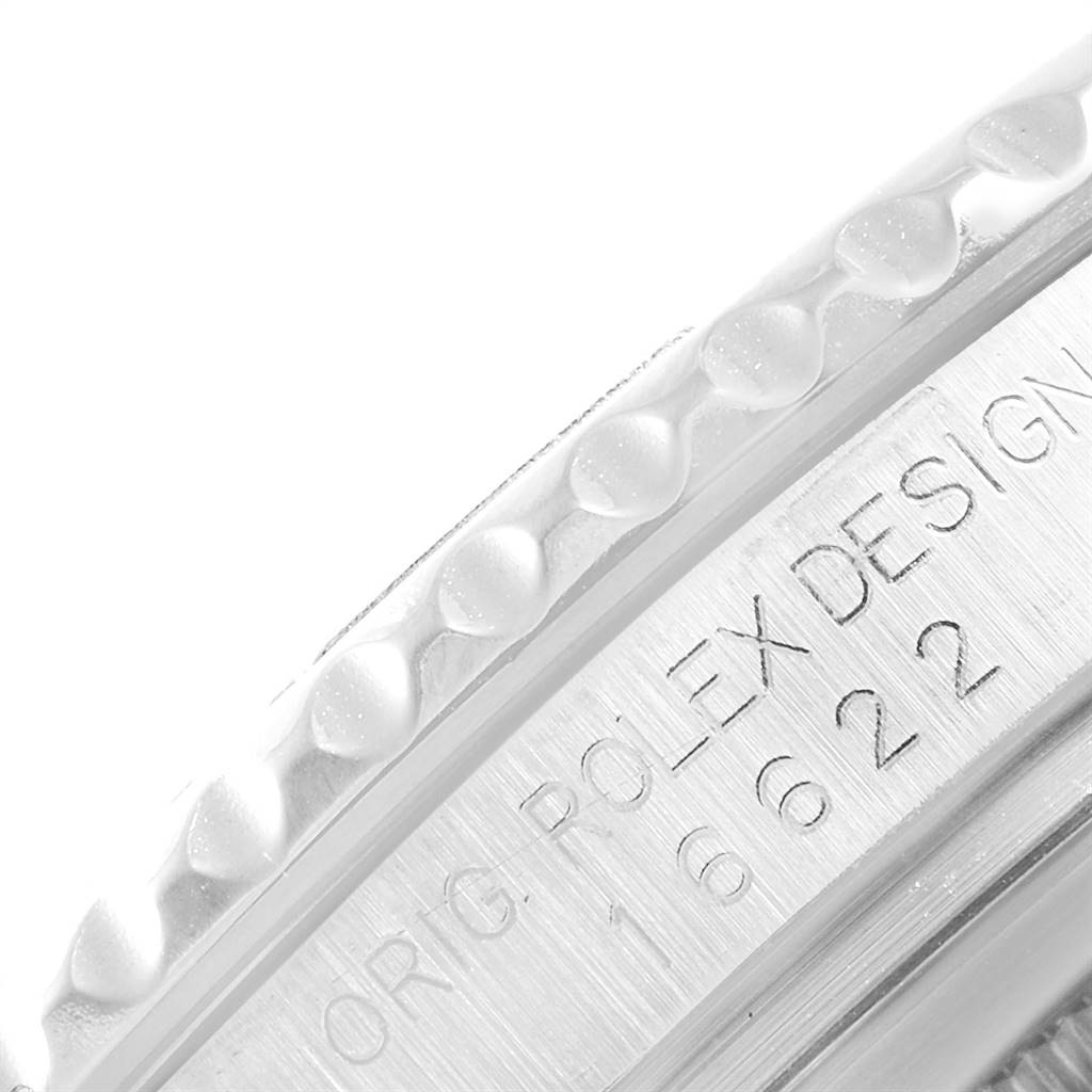 This close-up image shows the engraved lettering and bezel edge of a Rolex Yacht-Master 16622 Men
s Stainless Steel Silver Dial 16622 Men
s Stainless Steel Silver Dial watch.