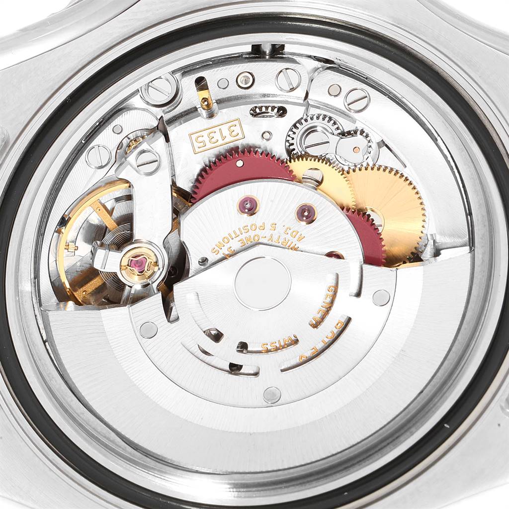 The image shows the internal mechanism and movement of the Rolex Yacht-Master 16622 Men
s Stainless Steel Silver Dial 16622 Men
s Stainless Steel Silver Dial watch from a rear angle.