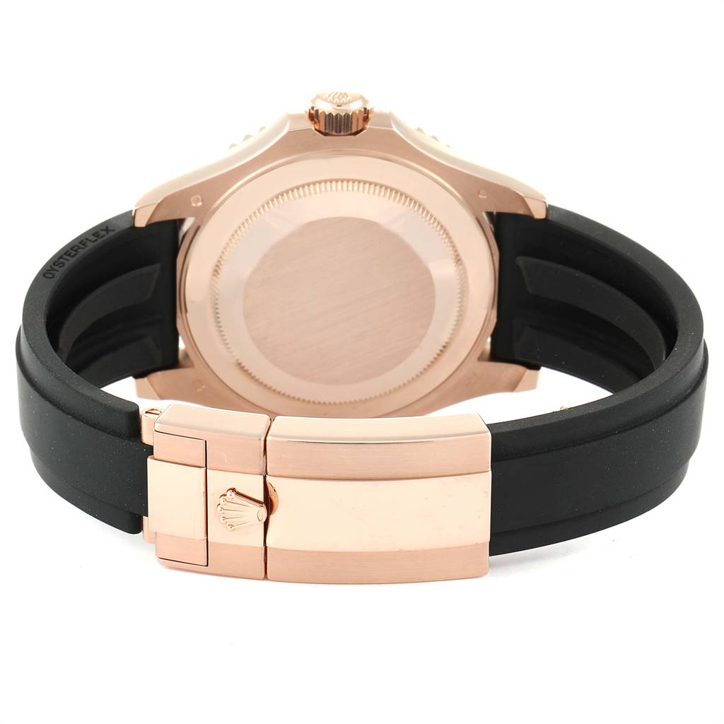 This is a rear angle view of a Rolex Yacht-Master 116655 Men's Rose Gold Black Dial 116655 Men's Rose Gold Black Dial watch, showcasing the back case and black rubber strap with clasp.