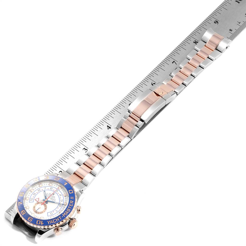 This image shows a top-down view of a Rolex Yacht-Master 116681 Men's Steel and Gold (two tone) White Dial 116681 Men's Steel and Gold (two tone) White Dial watch with a ruler measuring its bracelet length.