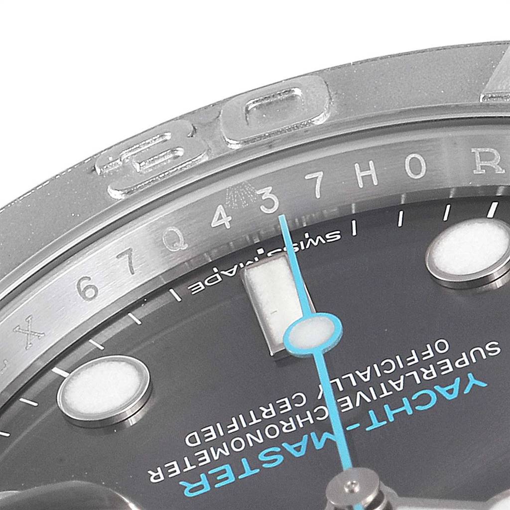 This close-up image of the Rolex Yacht-Master 116622 Men
s Stainless Steel Grey Dial 116622 Men
s Stainless Steel Grey Dial watch shows the bezel, partial dial, and hands. 