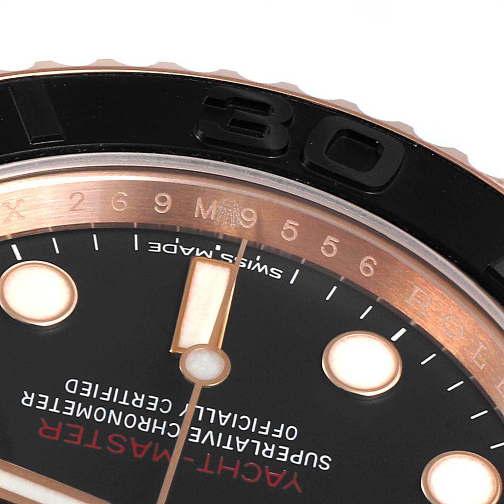 The image shows a close-up of the dial and bezel of a Rolex Yacht-Master 116655 Men's Rose Gold Black Dial 116655 Men's Rose Gold Black Dial watch.