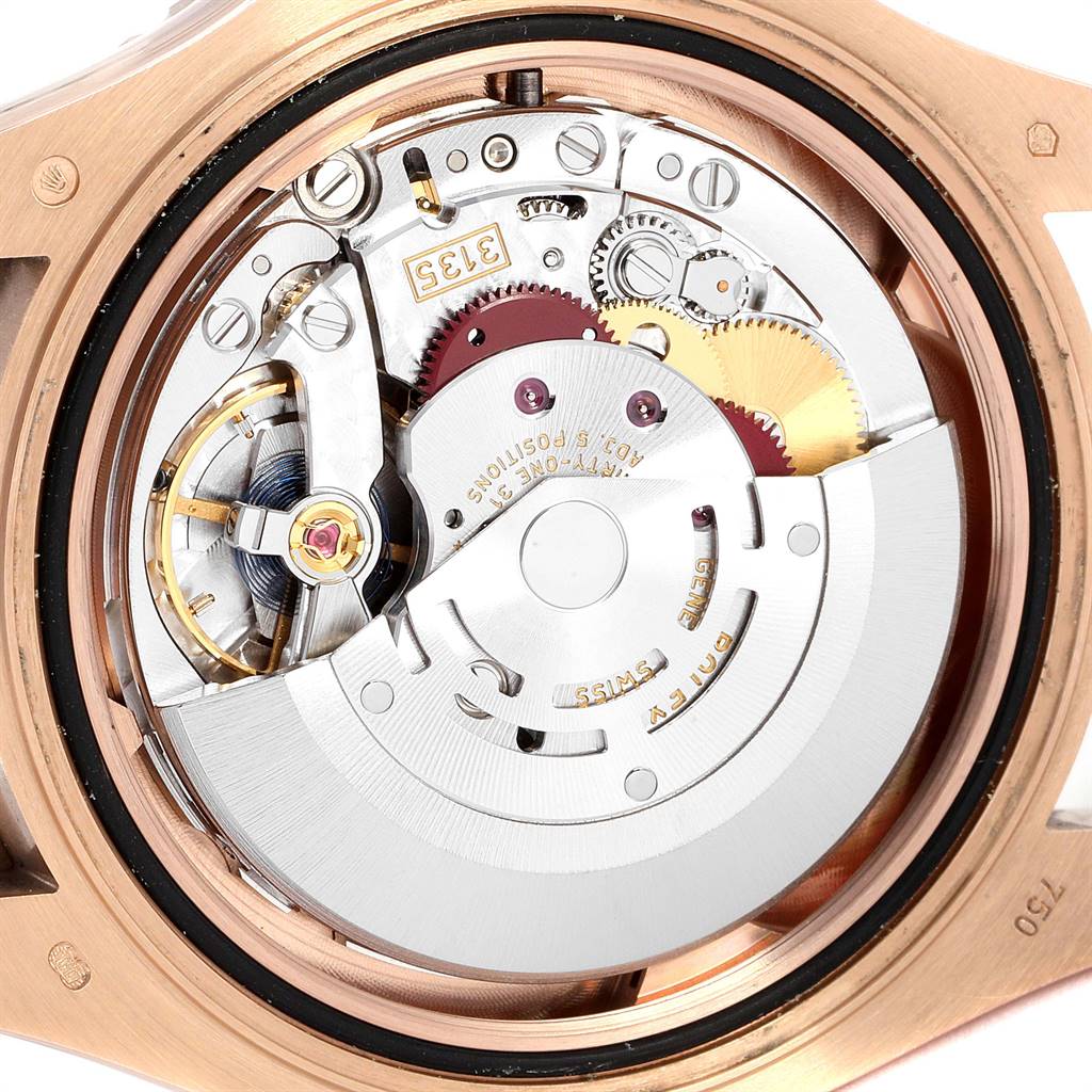 This image shows the Rolex Yacht-Master 116655 Men's Rose Gold Black Dial 116655 Men's Rose Gold Black Dial watch's mechanical movement from the back, revealing its inner components and metal gears.