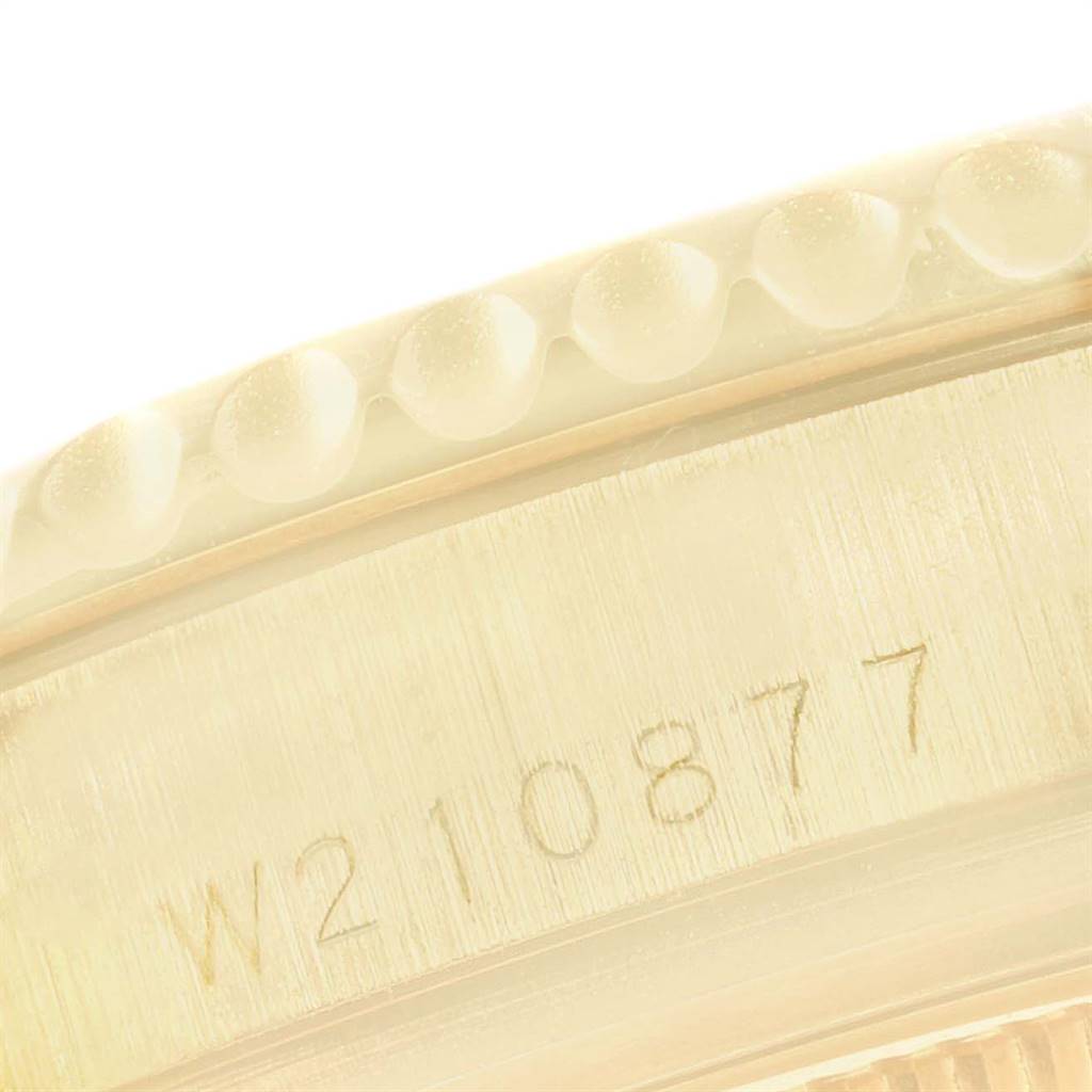 The image shows a close-up of the serial number on the case side of a Rolex Yacht-Master 68628 Yellow Gold Blue Dial 68628 Yellow Gold Blue Dial watch.