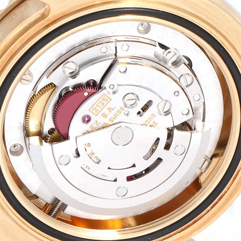The image shows a close-up view of the movement inside a Rolex Yacht-Master 68628 Yellow Gold Blue Dial 68628 Yellow Gold Blue Dial watch, displaying its intricate mechanical components.