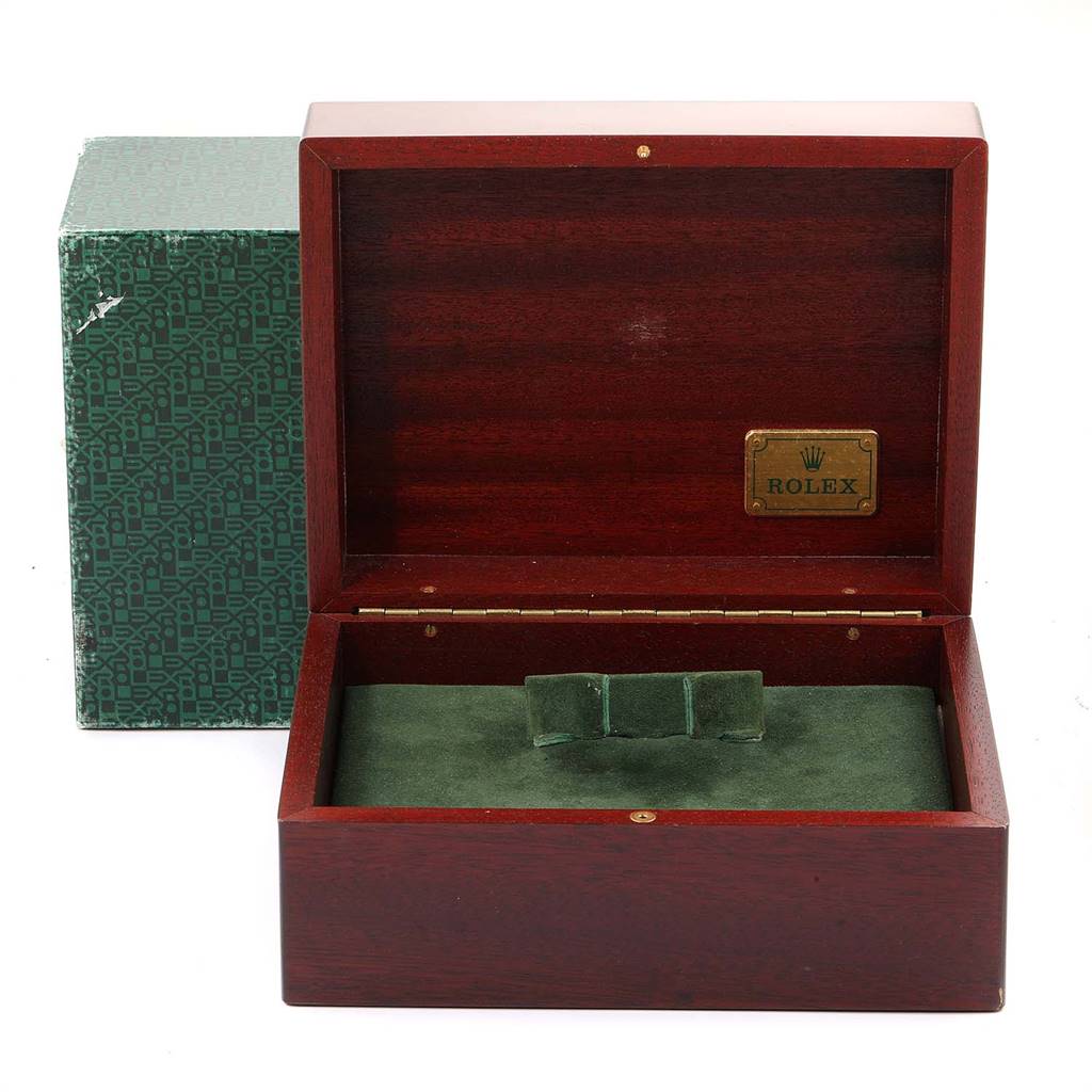 The image shows an open Rolex Yacht-Master 68628 Yellow Gold Blue Dial 68628 Yellow Gold Blue Dial watch box with a green velvet interior and a separate green outer box.