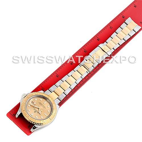 The image shows a Rolex Yacht-Master 16623 Men's Stainless Steel Champagne Dial 16623 Men's Stainless Steel Champagne Dial watch from a top-down angle, featuring the full bracelet and the dial side.