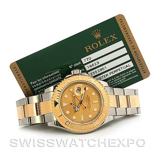 The image shows a front view of a Rolex Yacht-Master 16623 Men's Stainless Steel Champagne Dial 16623 Men's Stainless Steel Champagne Dial watch, along with its green certification card.