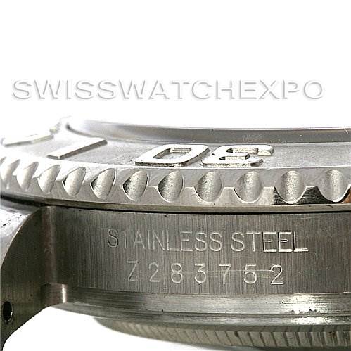 This image shows a close-up, side profile view of a Rolex Yacht-Master 16622 Men's Stainless Steel Silver Dial 16622 Men's Stainless Steel Silver Dial watch, focusing on the stainless steel bezel and case.