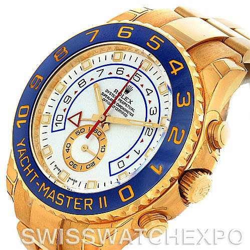 This image shows a Rolex Yacht-Master 116688WAO Men's Yellow Gold White Dial 116688WAO Men's Yellow Gold White Dial II watch at an angled view, displaying the face, crown, bezel, and part of the bracelet.