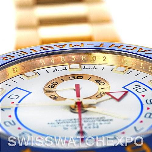 The image shows a close-up of the Rolex Yacht-Master 116688WAO Men's Yellow Gold White Dial 116688WAO Men's Yellow Gold White Dial watch dial, bezel, and part of the bracelet.
