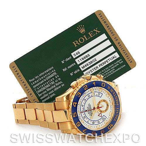 This image shows a Rolex Yacht-Master 116688WAO Men's Yellow Gold White Dial 116688WAO Men's Yellow Gold White Dial watch at a slight angle from the side with its certification card.