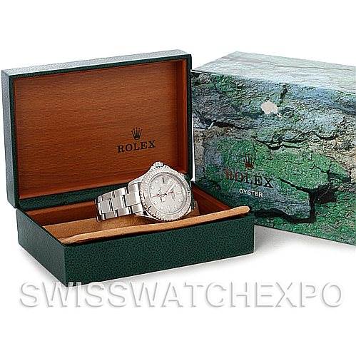 The image shows a Rolex Yacht-Master 16622 Men's Stainless Steel Silver Dial 16622 Men's Stainless Steel Silver Dial watch in its open box with a branded outer packaging beside it.