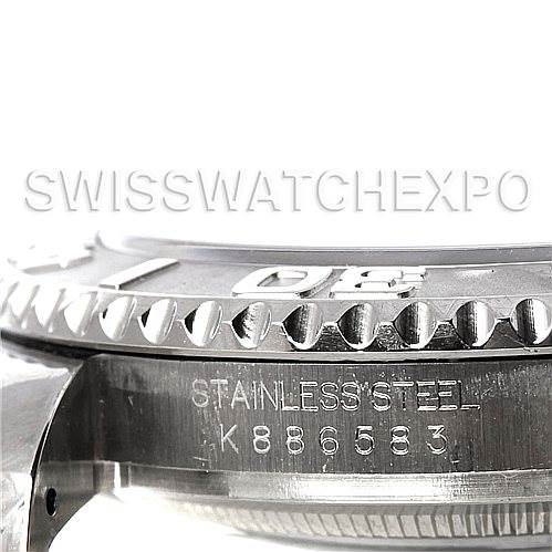 This close-up angle shows the side of the Rolex Yacht-Master 16622 Men's Stainless Steel Silver Dial 16622 Men's Stainless Steel Silver Dial watch, highlighting the bezel and the serial number engraved on the stainless steel.