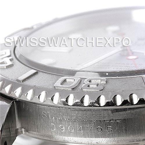 The image shows a close-up side angle of the Rolex Yacht-Master 16622 Men's Stainless Steel Silver Dial 16622 Men's Stainless Steel Silver Dial watch, highlighting the bezel and part of the stainless steel case with its serial number.