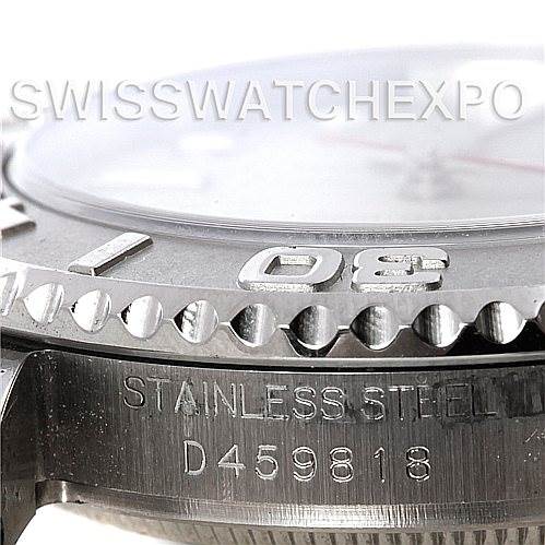 The image shows a close-up of the bezel, dial edge, and case of a Rolex Yacht-Master 168622 Stainless Steel Silver Dial 168622 Stainless Steel Silver Dial watch, highlighting the stainless steel material and serial number.