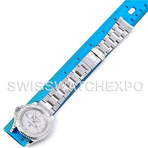 The image shows a top-down view of a Rolex Yacht-Master 16622 Men's Stainless Steel Silver Dial 16622 Men's Stainless Steel Silver Dial watch placed alongside a blue measuring ruler.