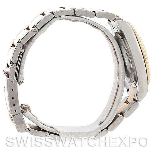 This is a side view of a Rolex Yacht-Master 168623 Men's Stainless Steel White Dial 168623 Men's Stainless Steel White Dial watch, highlighting its bracelet, clasp, and profile.