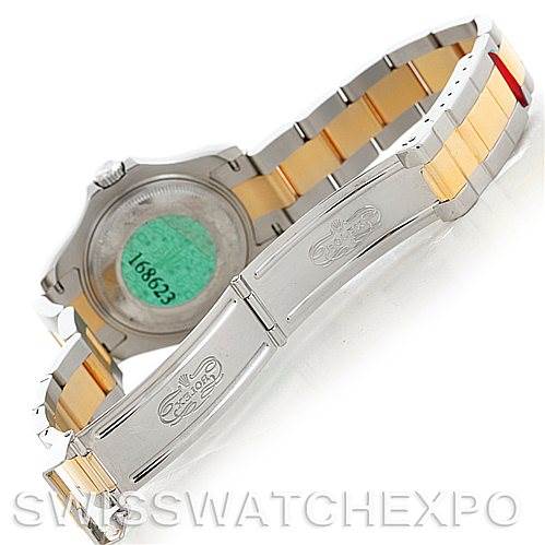 The image shows the back case and partly opened bracelet of a Rolex Yacht-Master 168623 Men's Stainless Steel White Dial 168623 Men's Stainless Steel White Dial watch.