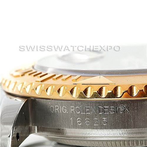 This close-up image of the Rolex Yacht-Master 16623 Men's Stainless Steel Grey Dial 16623 Men's Stainless Steel Grey Dial shows the side of the case with the model number 16623 and the design engraving.