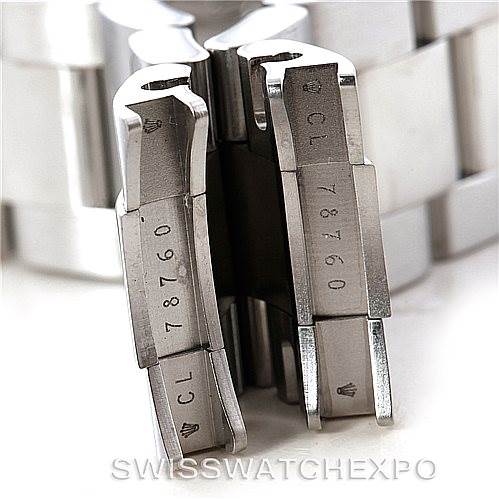 Close-up shot of the bracelet link clasp for the Rolex Yacht-Master 16622 Men's Stainless Steel Silver Dial 16622 Men's Stainless Steel Silver Dial model, showing its serial number and partial Rolex crown logos.