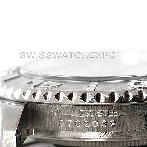 This close-up shot shows the side of the Rolex Yacht-Master 16622 Men's Stainless Steel Silver Dial 16622 Men's Stainless Steel Silver Dial watch, including part of the bezel and the engraved serial number.