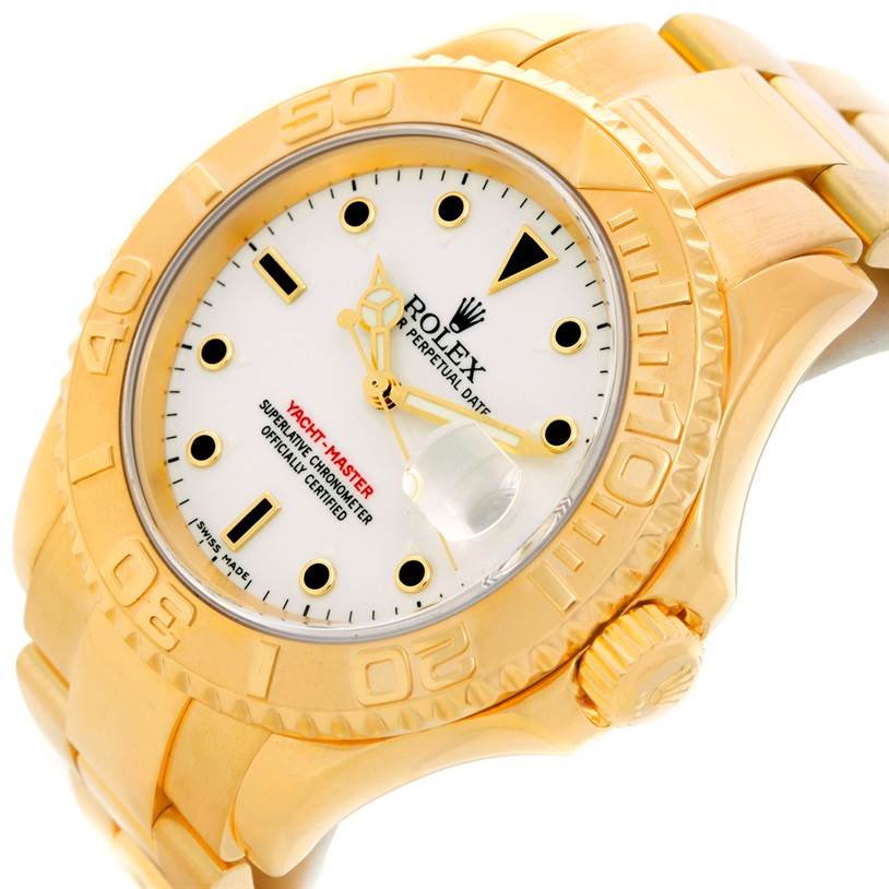 The image shows the front and side angle of a Rolex Yacht-Master 16628 Men's Yellow Gold White Dial 16628 Men's Yellow Gold White Dial watch, highlighting the dial, bezel, and bracelet.