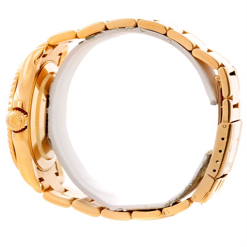 The image shows a side view of a Rolex Yacht-Master 16628 Men's Yellow Gold White Dial 16628 Men's Yellow Gold White Dial watch, focusing on the crown, case, and bracelet.