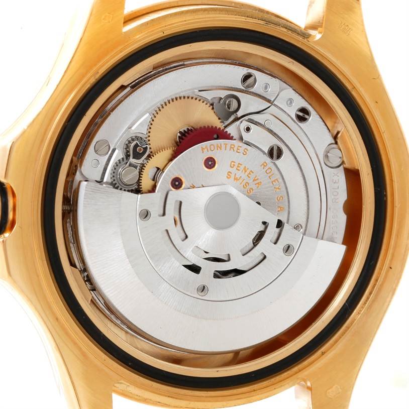 The image shows the internal mechanism of a Rolex Yacht-Master 16628 Men's Yellow Gold White Dial 16628 Men's Yellow Gold White Dial watch from a rear perspective with the case back removed.