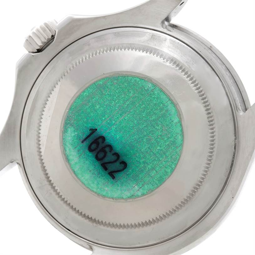 The image shows the back case, including the winding crown, of a Rolex Yacht-Master 16622 Men's Stainless Steel Silver Dial 16622 Men's Stainless Steel Silver Dial model watch.